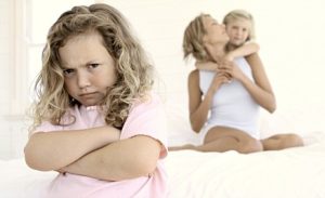 Girl Jealous of Mother and Sister --- Image by © Pixland/Corbis